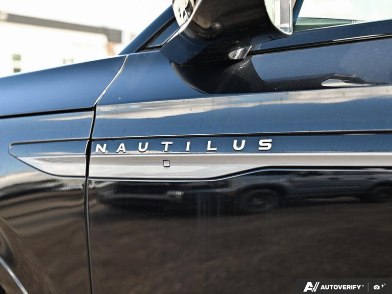 NEW 2026 Lincoln Nautilus Reserve Hybrid - Infinite Black Metallic Clearcoat Exterior / HOT CHOCOLATE, PREMIUM LEATHER-TRIMMED HEAT/VENT CAPTAIN'S CHAIR Interior - $83,586 - Stock #E61028 - VIN 5LMPJ8K49TJ064653 - Photo 27