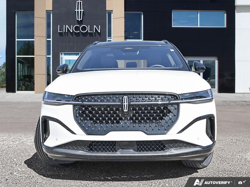 NEW 2026 Lincoln Nautilus Reserve Hybrid - White Platinum Metallic Tri-coat Exterior / HOT CHOCOLATE, PREMIUM LEATHER-TRIMMED HEAT/VENT CAPTAIN'S CHAIR Interior - $84,409 - Stock #E61034 - VIN 5LMPJ8K43TJ066804 - Photo 2