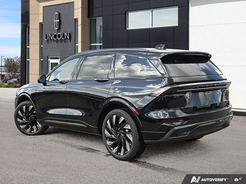 NEW 2026 Lincoln Nautilus Reserve Hybrid - Infinite Black Metallic Clearcoat Exterior / HOT CHOCOLATE, PREMIUM LEATHER-TRIMMED HEAT/VENT CAPTAIN'S CHAIR Interior - $83,586 - Stock #E61028 - VIN 5LMPJ8K49TJ064653 - Photo 4