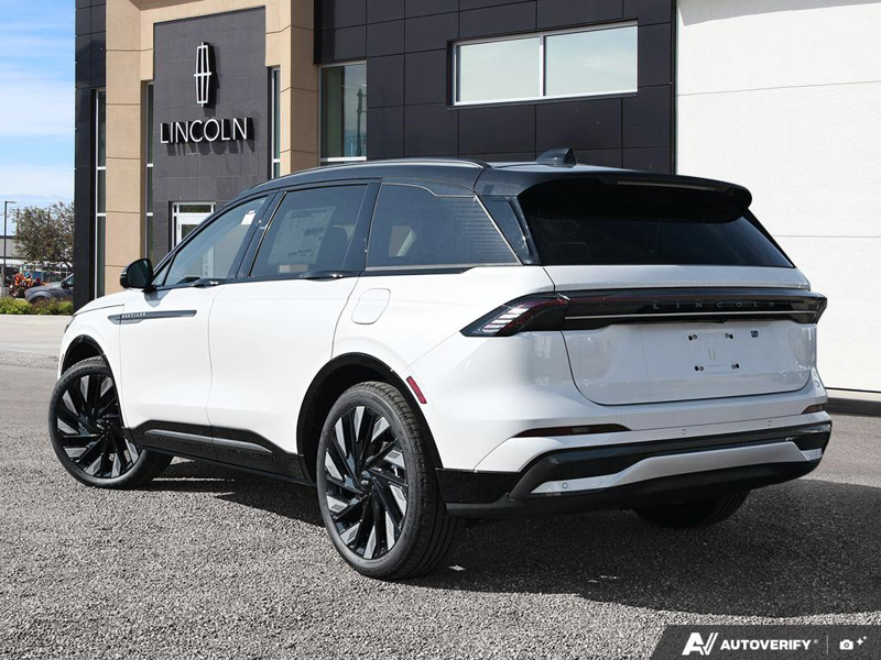 NEW 2026 Lincoln Nautilus Reserve Hybrid - White Platinum Metallic Tri-coat Exterior / MEDIUM LIGHT SPACE GRAY, PREMIUM LEATHER-TRIMMED HEAT/VENT CAPTA Interior - $84,258 - Stock #E61032 - VIN 5LMPJ8K43TJ066799 - Photo 4