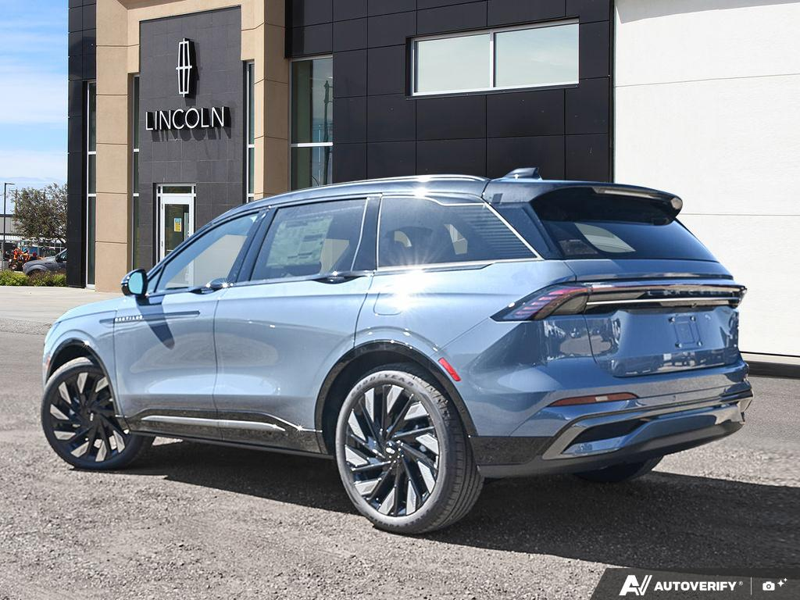 NEW 2026 Lincoln Nautilus Reserve Hybrid - Whisper Blue Metallic Clearcoat Exterior / HOT CHOCOLATE, PREMIUM LEATHER-TRIMMED HEAT/VENT CAPTAIN'S CHAIR Interior - $84,409 - Stock #E61035 - VIN 5LMPJ8K41TJ066803 - Photo 4