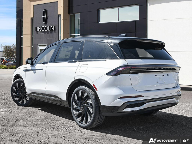 NEW 2026 Lincoln Nautilus Reserve Hybrid - White Platinum Metallic Tri-coat Exterior / HOT CHOCOLATE, PREMIUM LEATHER-TRIMMED HEAT/VENT CAPTAIN'S CHAIR Interior - $84,409 - Stock #E61034 - VIN 5LMPJ8K43TJ066804 - Photo 4