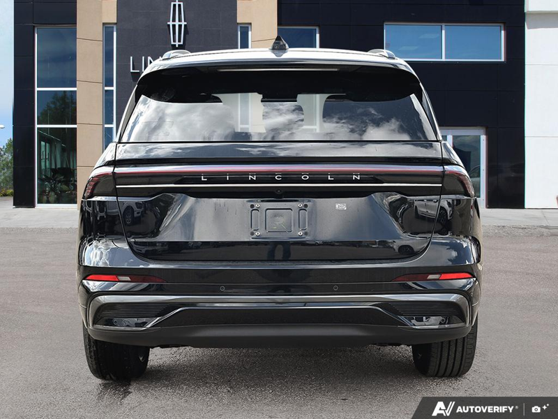 NEW 2026 Lincoln Nautilus Reserve Hybrid - Infinite Black Metallic Clearcoat Exterior / HOT CHOCOLATE, PREMIUM LEATHER-TRIMMED HEAT/VENT CAPTAIN'S CHAIR Interior - $83,586 - Stock #E61028 - VIN 5LMPJ8K49TJ064653 - Photo 5