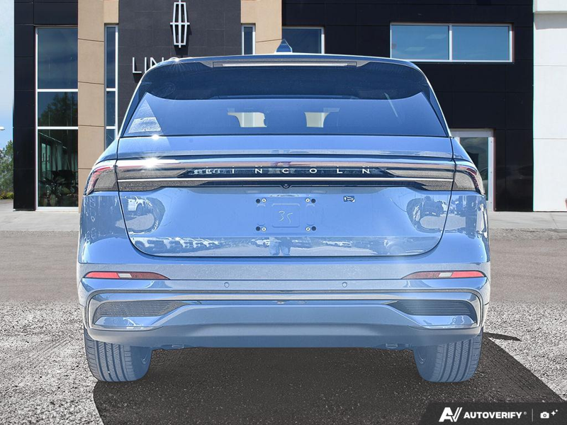 NEW 2026 Lincoln Nautilus Reserve Hybrid - Whisper Blue Metallic Clearcoat Exterior / HOT CHOCOLATE, PREMIUM LEATHER-TRIMMED HEAT/VENT CAPTAIN'S CHAIR Interior - $84,409 - Stock #E61035 - VIN 5LMPJ8K41TJ066803 - Photo 5