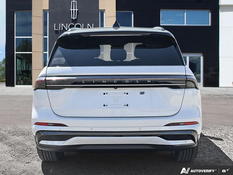 NEW 2026 Lincoln Nautilus Reserve Hybrid - White Platinum Metallic Tri-coat Exterior / HOT CHOCOLATE, PREMIUM LEATHER-TRIMMED HEAT/VENT CAPTAIN'S CHAIR Interior - $84,409 - Stock #E61034 - VIN 5LMPJ8K43TJ066804 - Photo 5