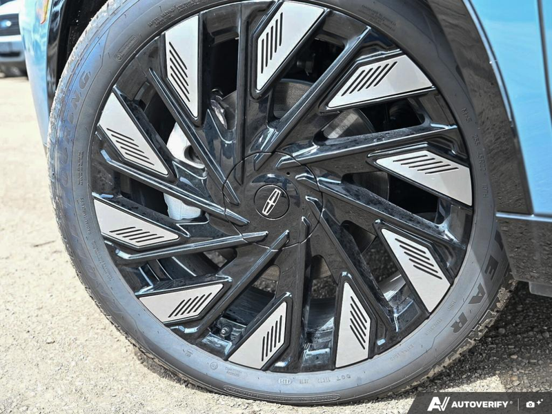 NEW 2026 Lincoln Nautilus Reserve - Whisper Blue Metallic Clearcoat Exterior / HOT CHOCOLATE, PREMIUM LEATHER-TRIMMED Interior - $79,093 - Stock #E60614 - VIN 5LMPJ8KA9TJ041430 - Photo 6