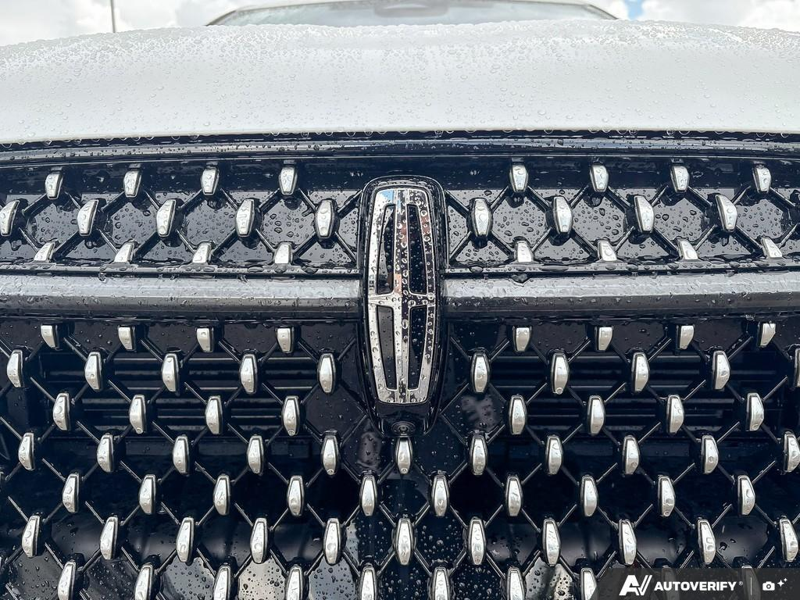 DEMO 2026 Lincoln Nautilus Premiere - White Platinum Metallic Tri-coat Exterior / MEDIUM LIGHT SPACE GRAY, LINCOLN SOFT TOUCH HEATED FRONT CAPTAIN Interior - $64,088 - Stock #E60744 - VIN 5LMPJ8JA7TJ053738 - Photo 9
